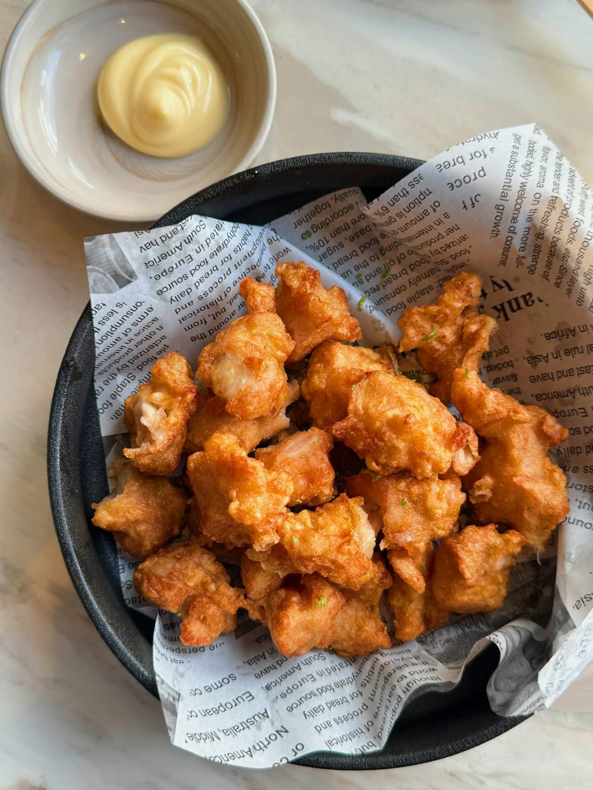Crispy Korean fried chicken bites in light golden batter