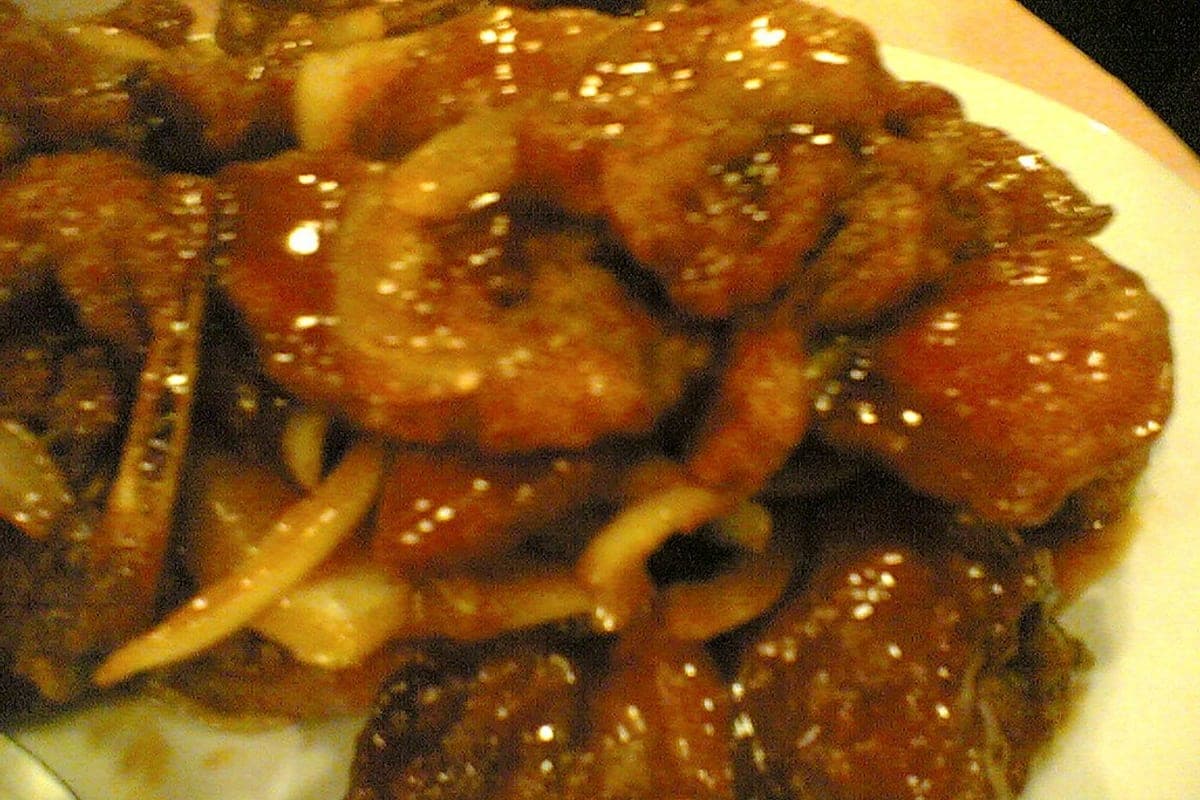Crisp fried pork pieces coated in a glossy sauce