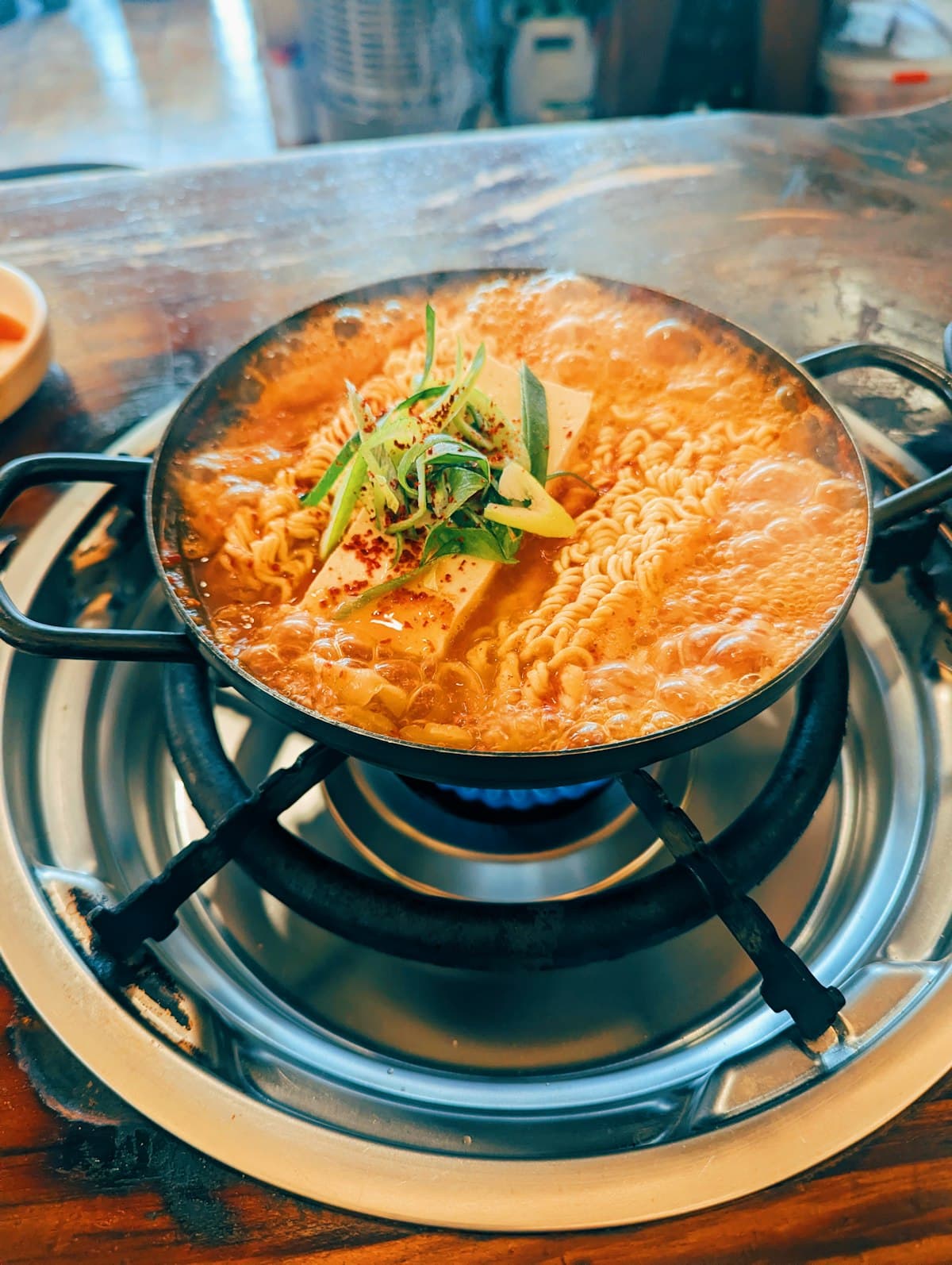 A block of curly instant noodles ready to cook
