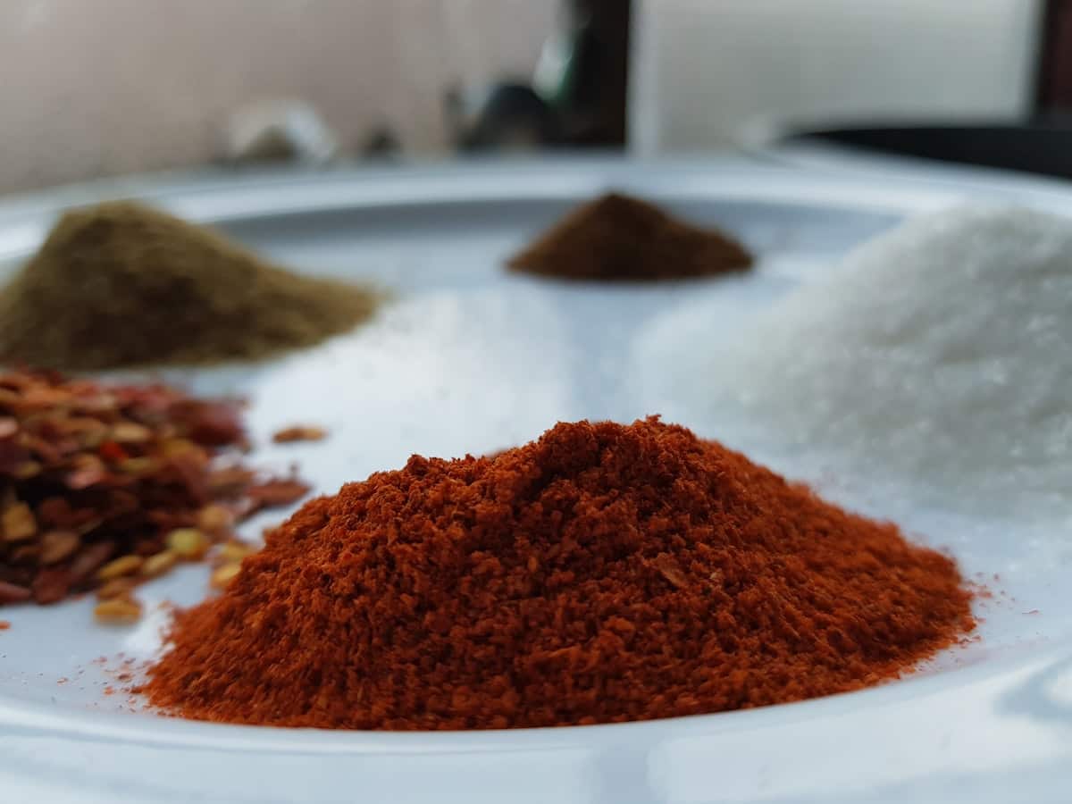 A pile of coarse red Korean chili flakes on a plate