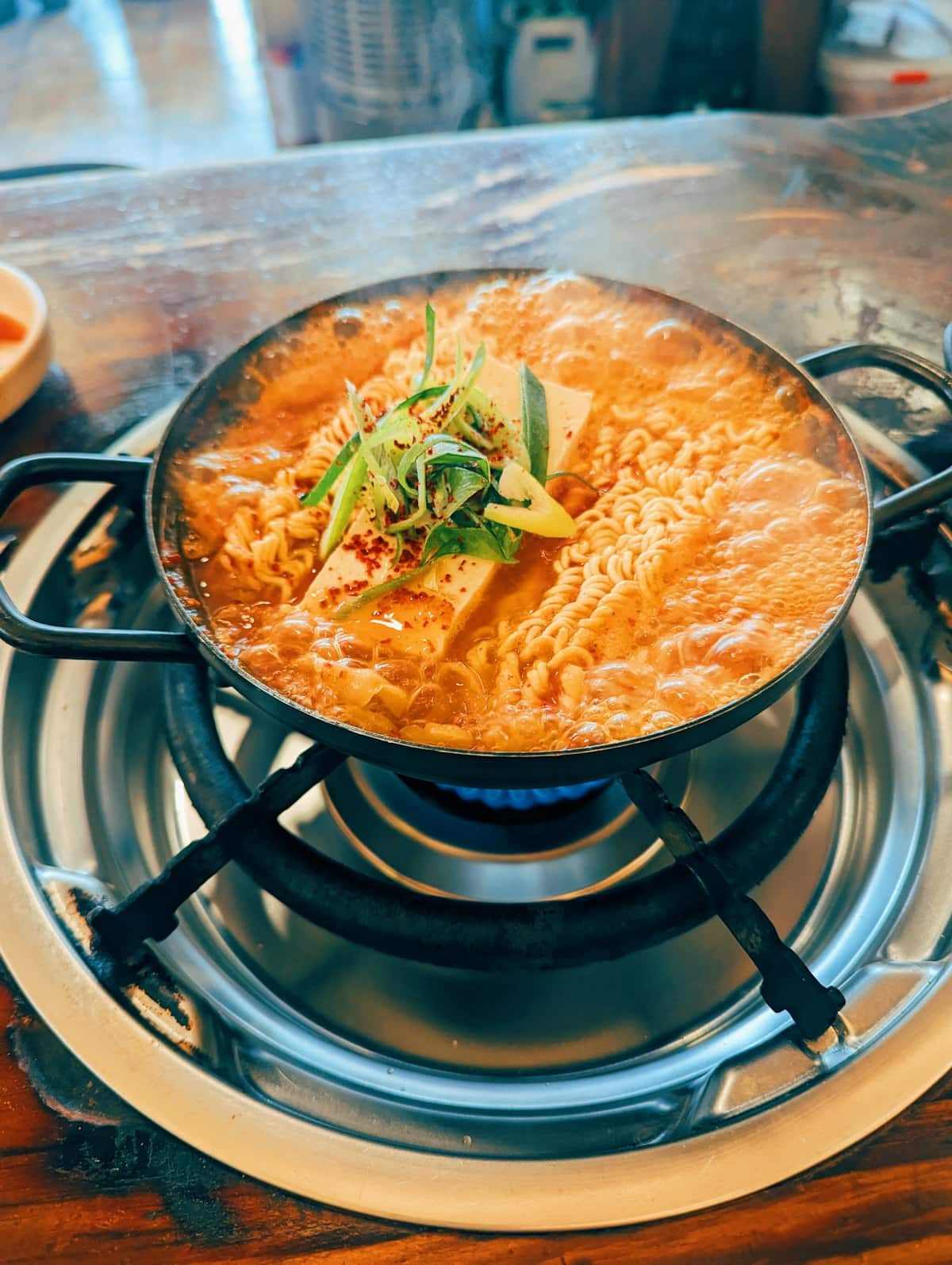 A block of curly instant noodles ready to cook