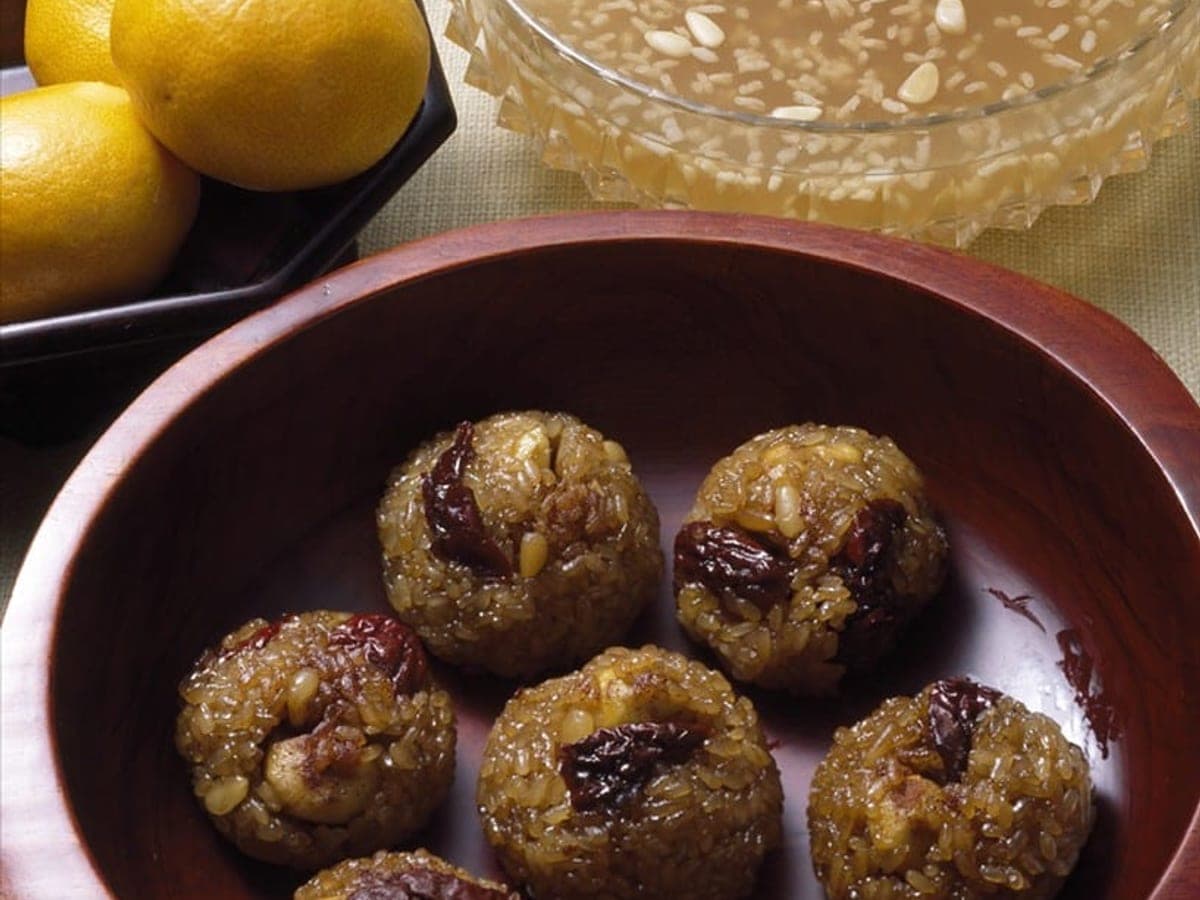 Dark sweet glutinous rice studded with chestnuts, jujubes and pine nuts