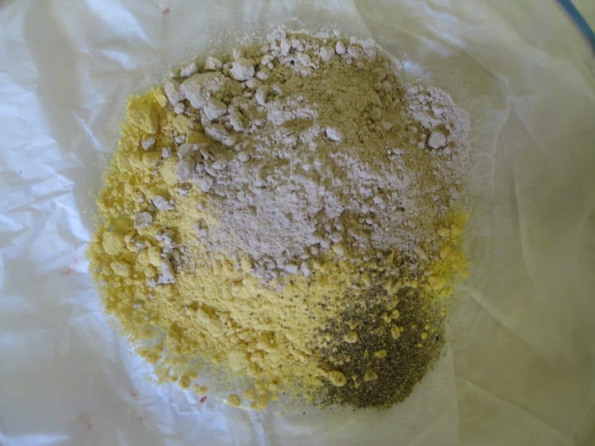 Pale yellow mustard powder on paper