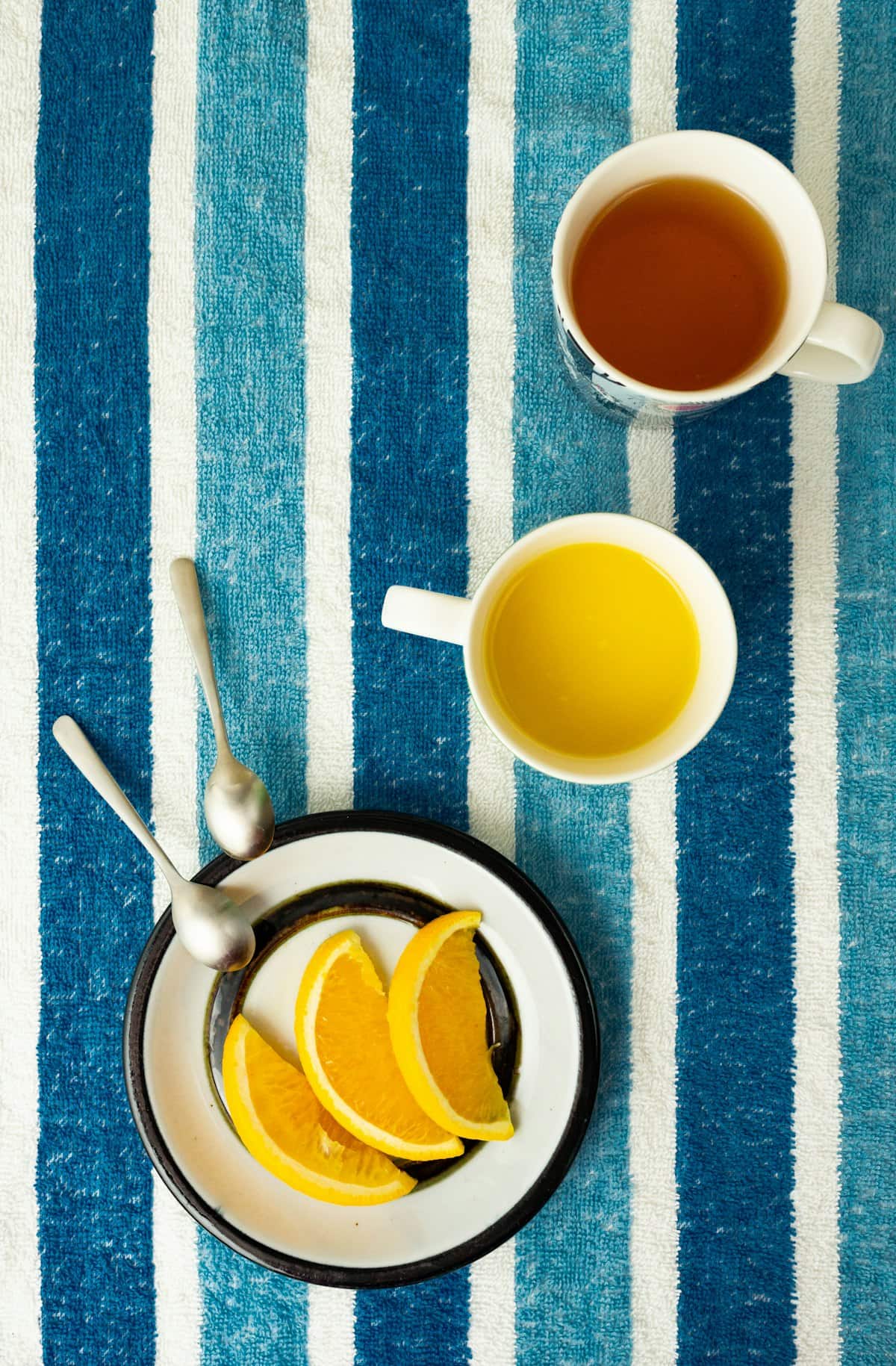 A warm golden cup of citron tea with honey-preserved peel